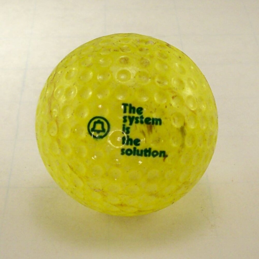 Bell 70s Golf ball* The System is the Solution.